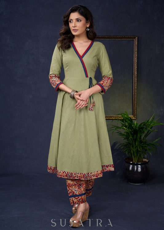 Exclusive-Sage-Green-Cotton-A-Line-Kurta-With-Kalamkari-Combination-Pant-Optional