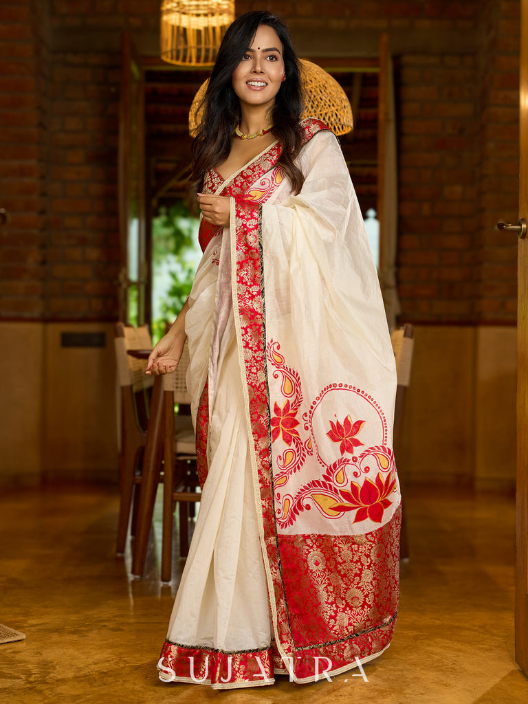 Heritage white Chanderi saree with benarasi border featuring artisanal hand-painted floral motifs