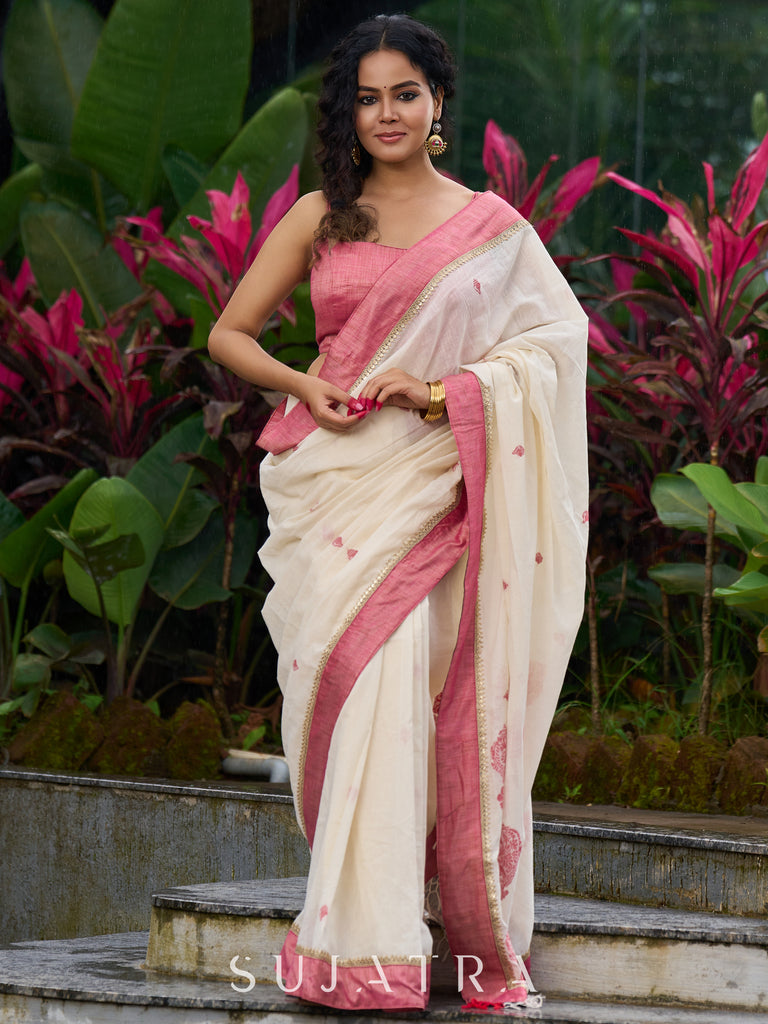 Ivory Jamdani cotton saree with delicate pink woven paisley motifs