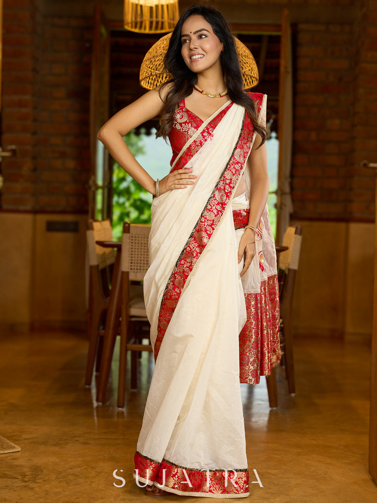 Heritage white Chanderi saree with benarasi border featuring artisanal hand-painted floral motifs