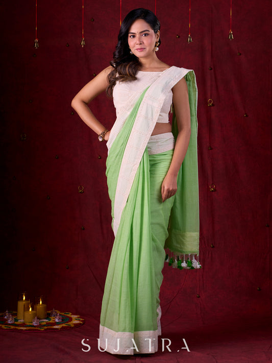 Soft Pastel Green Mul Cotton Saree Adorned with Delicate Hakoba Border & Pallu