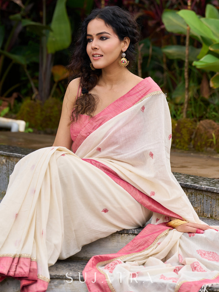 Ivory Jamdani cotton saree with delicate pink woven paisley motifs