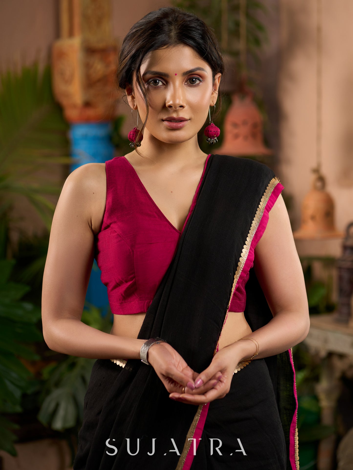 Pure black cotton saree with zari border & pom poms