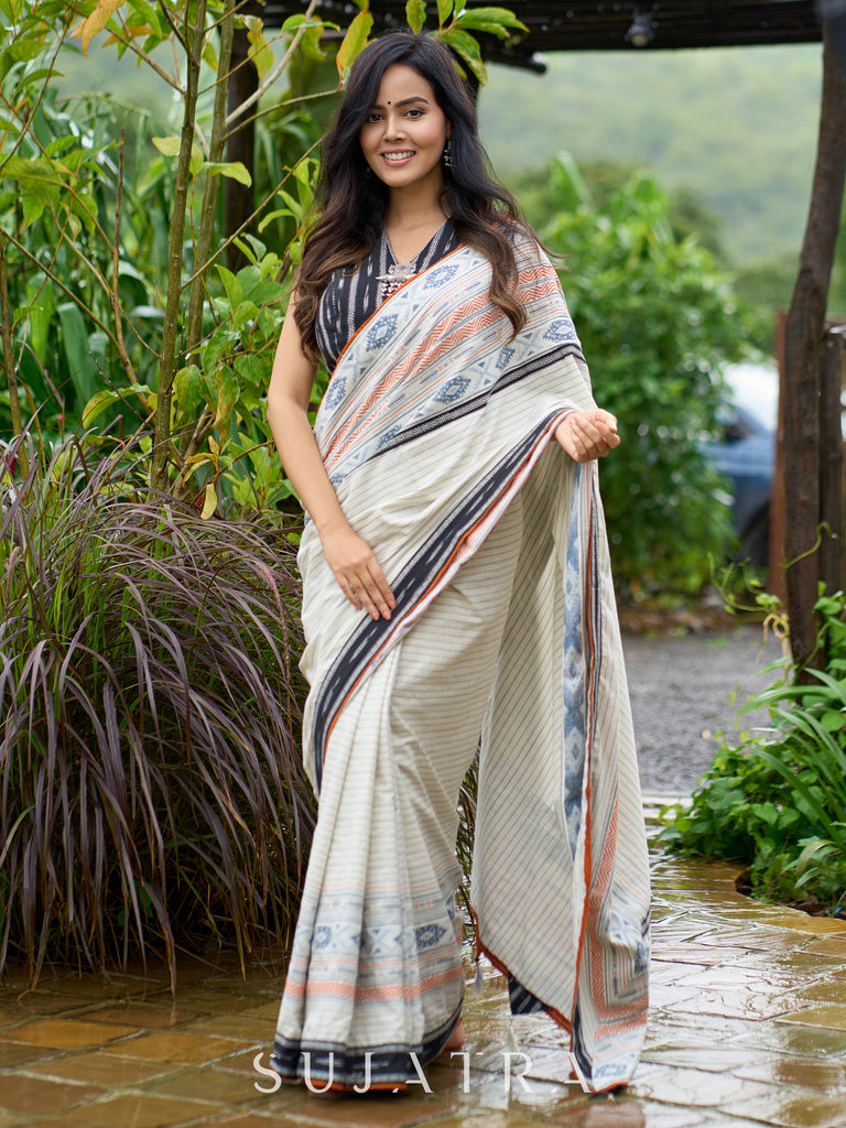 Classic off-white cotton saree with subtle Jamdani-style woven motifs