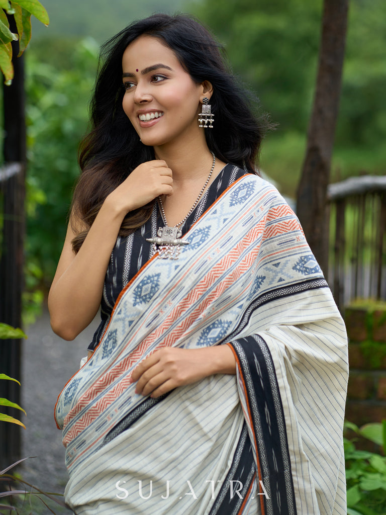 Classic off-white cotton saree with subtle Jamdani-style woven motifs