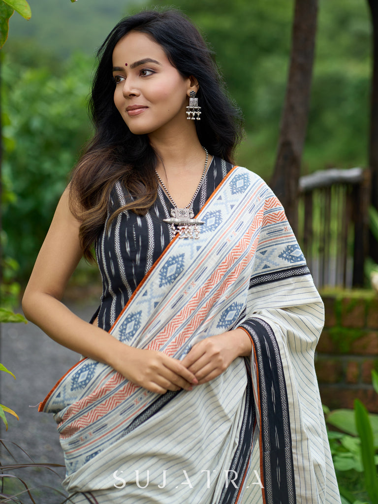 Classic off-white cotton saree with subtle Jamdani-style woven motifs