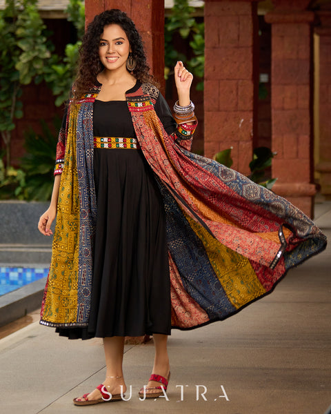 Black Rayon Double-Flared Sleeveless Dress with Mirror Work Embellishments  -  Patchwork Ajrakh Jacket Additional