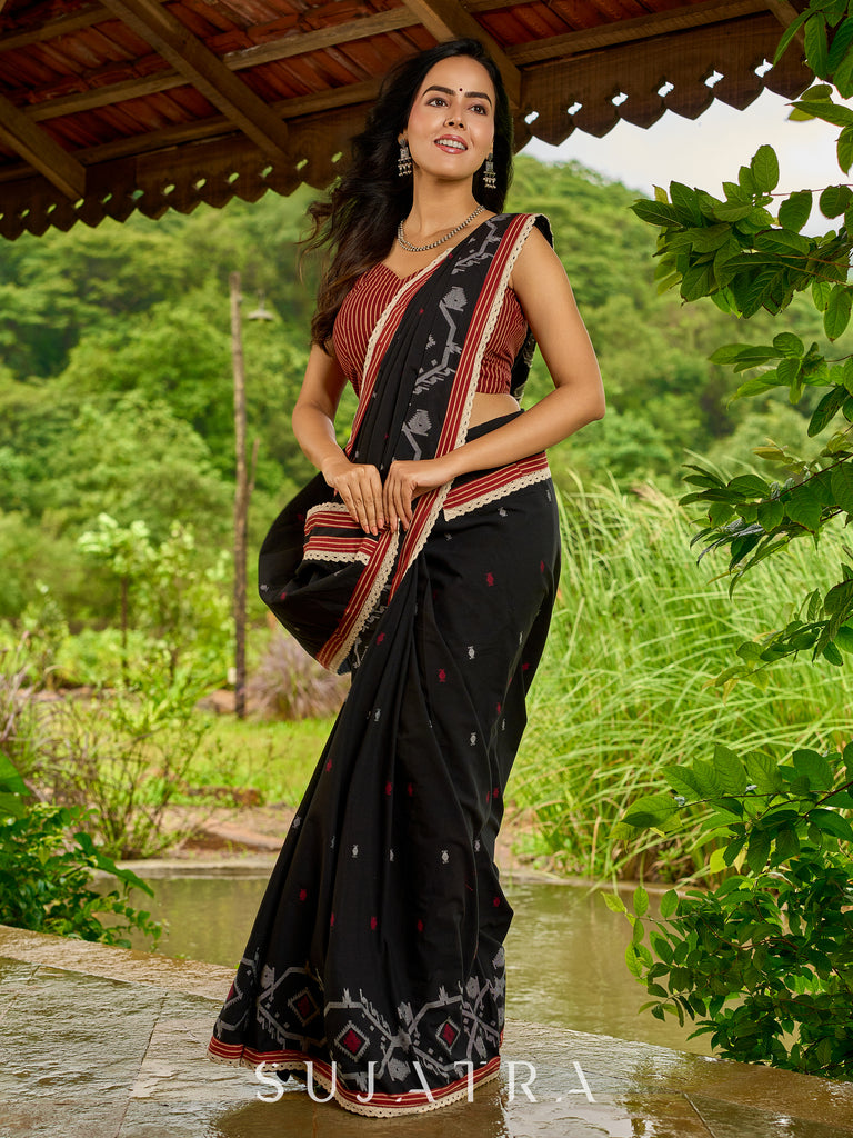 Heritage black cotton saree blending Jamdani-inspired weaves with Ajrakh elegance
