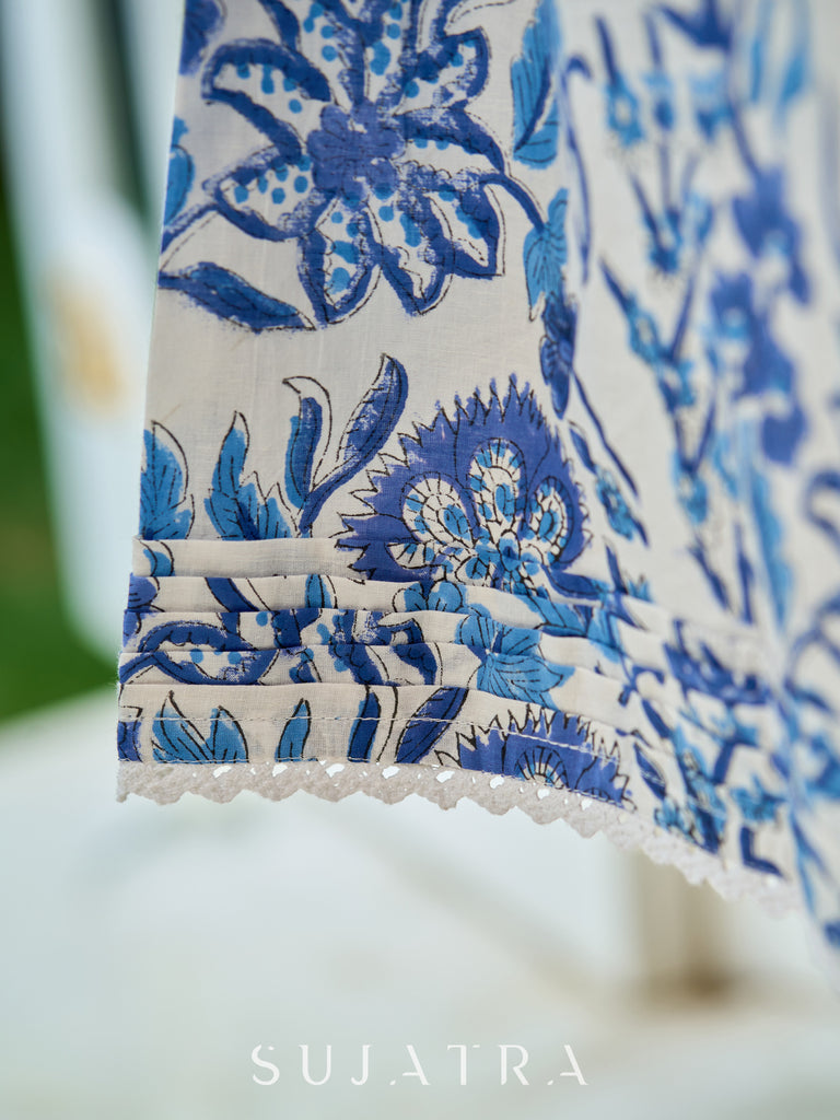 Poised White Floral Printed Dress featuring a Sweetheart Neckline, Pleated Bodice, and Crochet Lace Trims