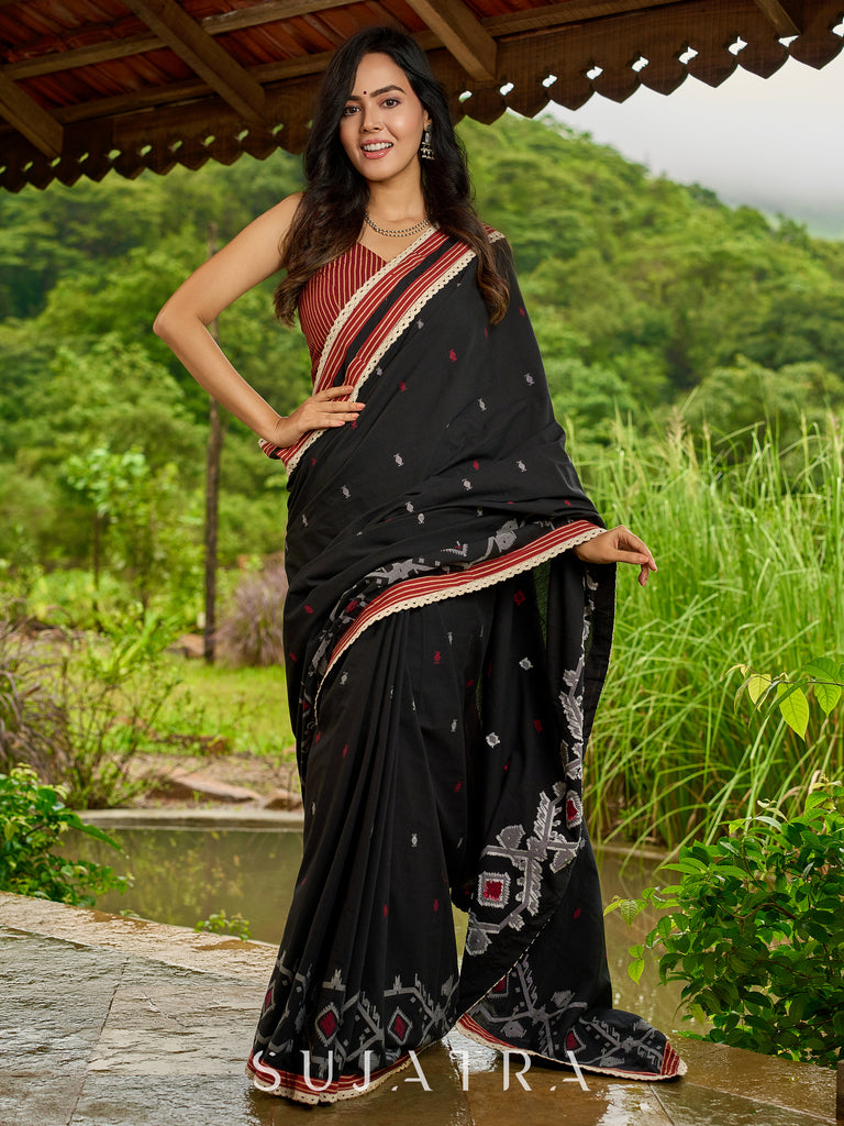 Heritage black cotton saree blending Jamdani-inspired weaves with Ajrakh elegance