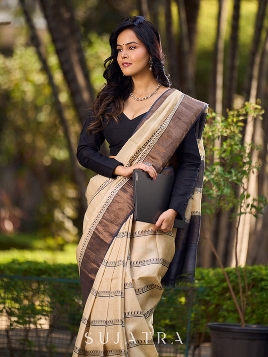Timeless Ivory Tussar Saree with Subtle Stripes & Handcrafted Detailing