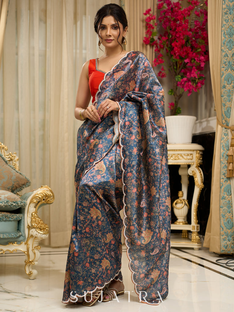Exclusive floral printed saree with delicate hand embroidery and scalloped embroidered edges