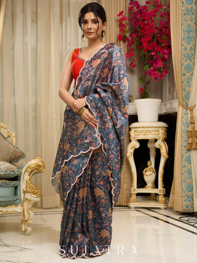 Exclusive floral printed saree with delicate hand embroidery and scalloped embroidered edges