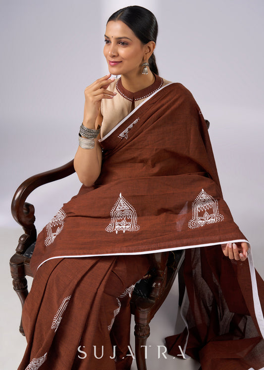 Minimalist brown cotton saree with sophisticated hand painting motifs