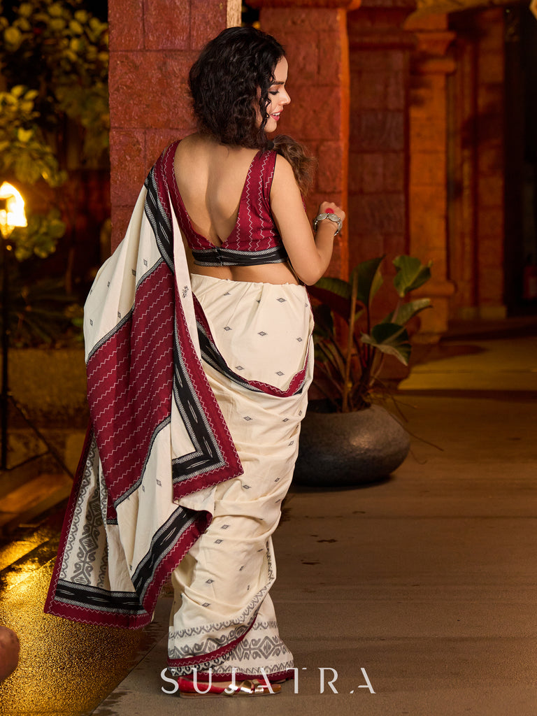 Classic ivory cotton saree adorned with Jamdani-inspired woven motifs