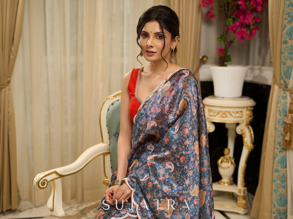 Exclusive floral printed saree with delicate hand embroidery and scalloped embroidered edges