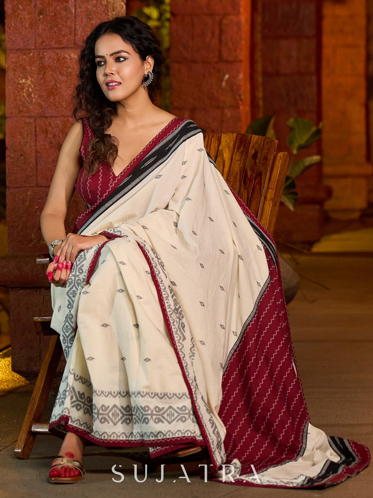 Classic ivory cotton saree adorned with Jamdani-inspired woven motifs