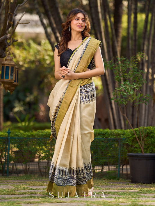 Off-White Handwoven Pure Tussar Silk Block Printed Saree with Traditional Green and Gold Zari Detailing