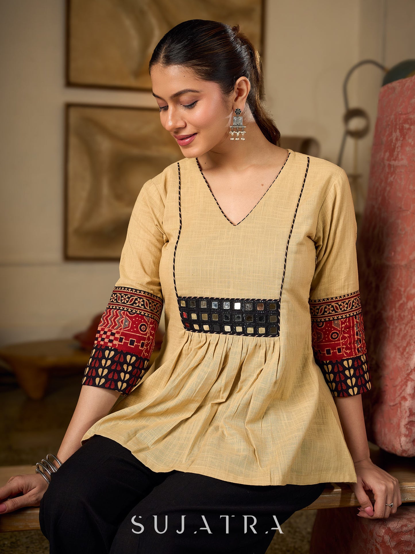 Chic Beige Cotton Top Enhanced With Ajrakh Print Sleeves & Embellished Kutch Mirror Work Yoke