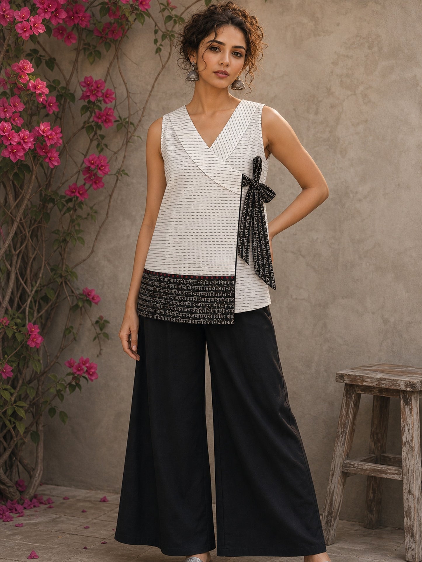 Refined black cotton pants crafted for all-day comfort, graceful movement, and versatile wardrobe styling.
