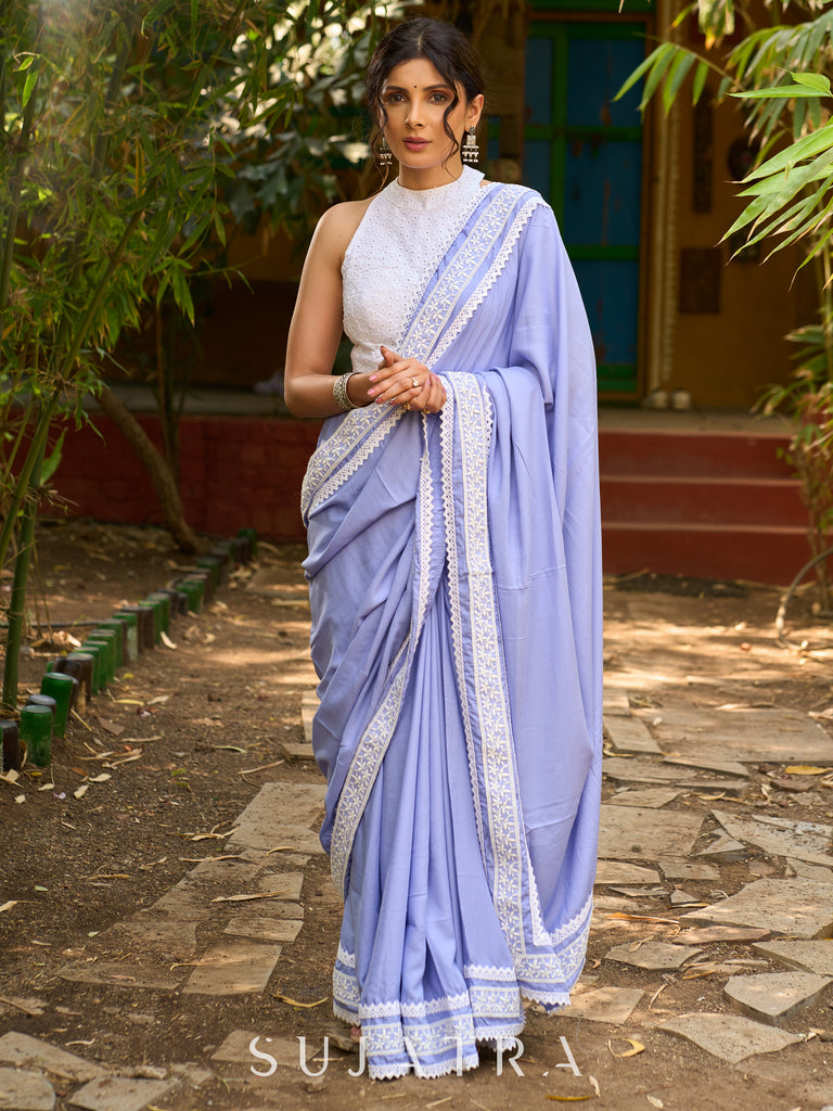Pastel lavender modal blend saree with delicate lace borders and modern elegance