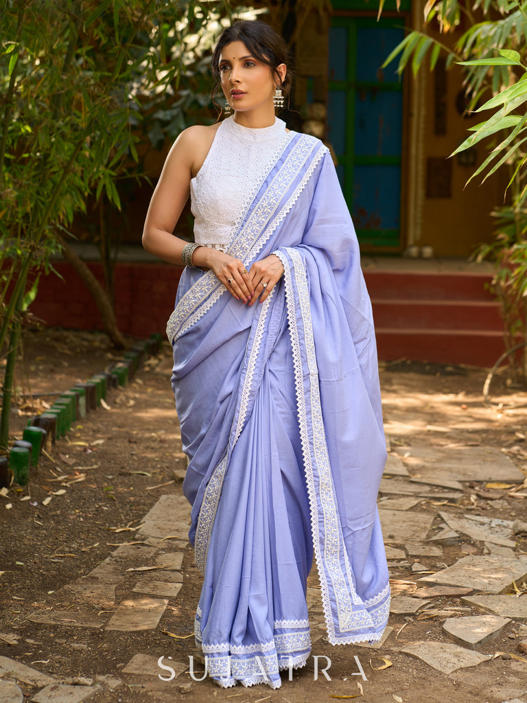 Pastel lavender modal blend saree with delicate lace borders and modern elegance