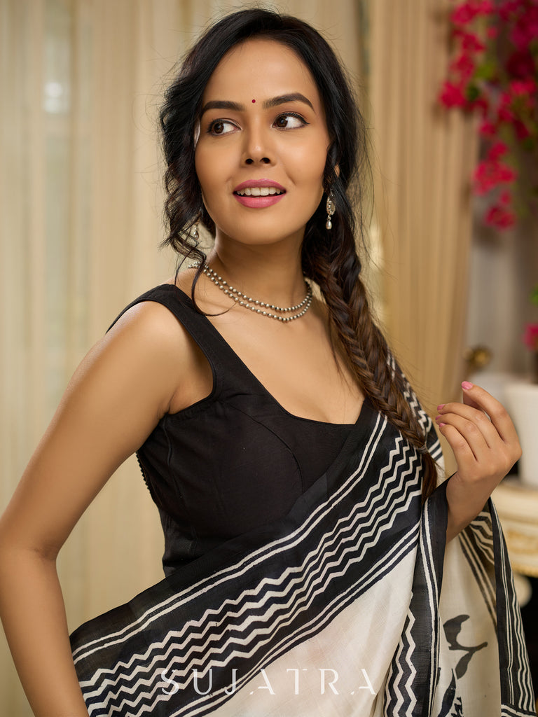 Pure silk saree with bold black block prints and timeless grace