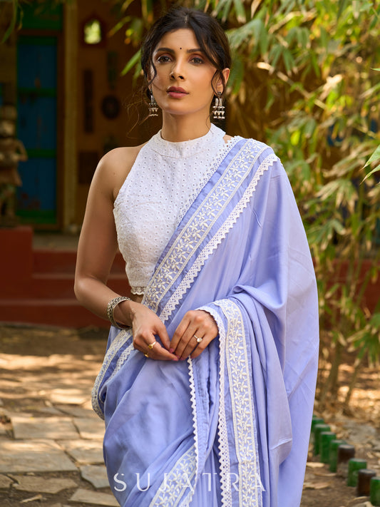 Pastel lavender modal blend saree with delicate lace borders and modern elegance