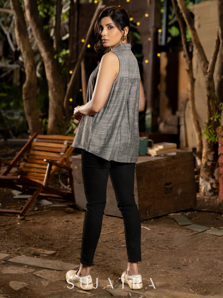 Graceful Sleeveless Grey Handloom Cotton Shirt with Hand-Embroidered Floral Accents