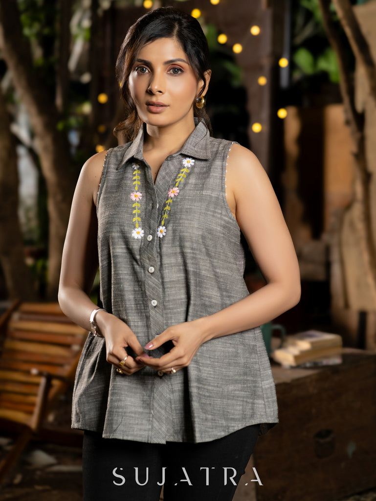 Graceful Sleeveless Grey Handloom Cotton Shirt with Hand-Embroidered Floral Accents