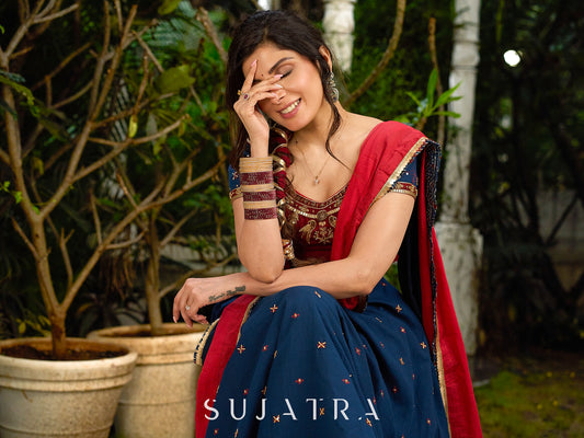 A Modern Royal ensemble - Stunning Jamdani Lehenga Choli with a monochrome blue base & contrast maroon and all over Zardosi embroidery - Shaded Dupatta Optional