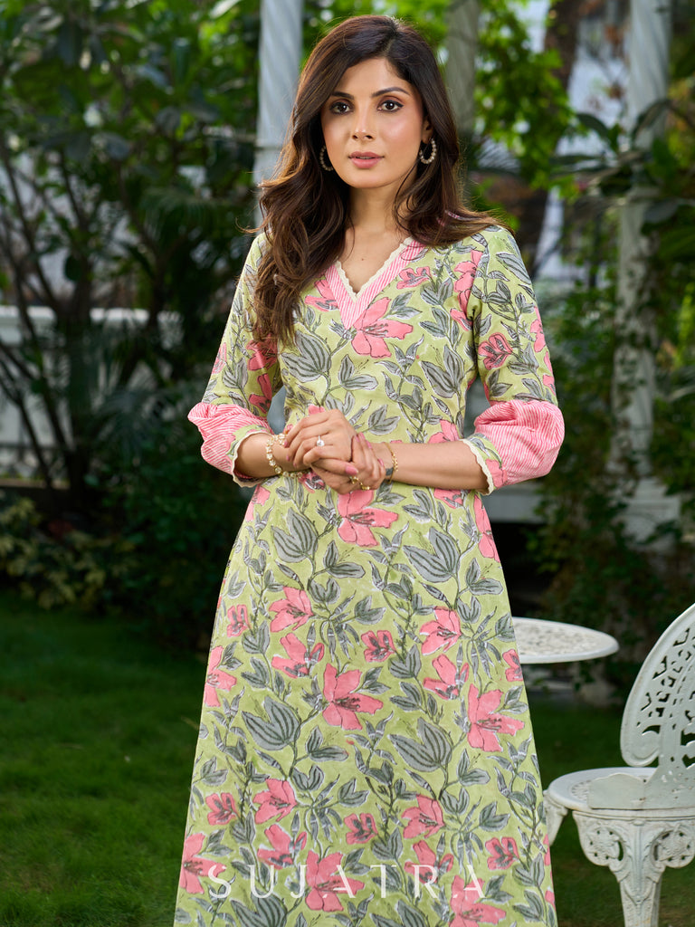 Graceful Pista Green Dress with Contrasting Pink Touches and Lace Detailing