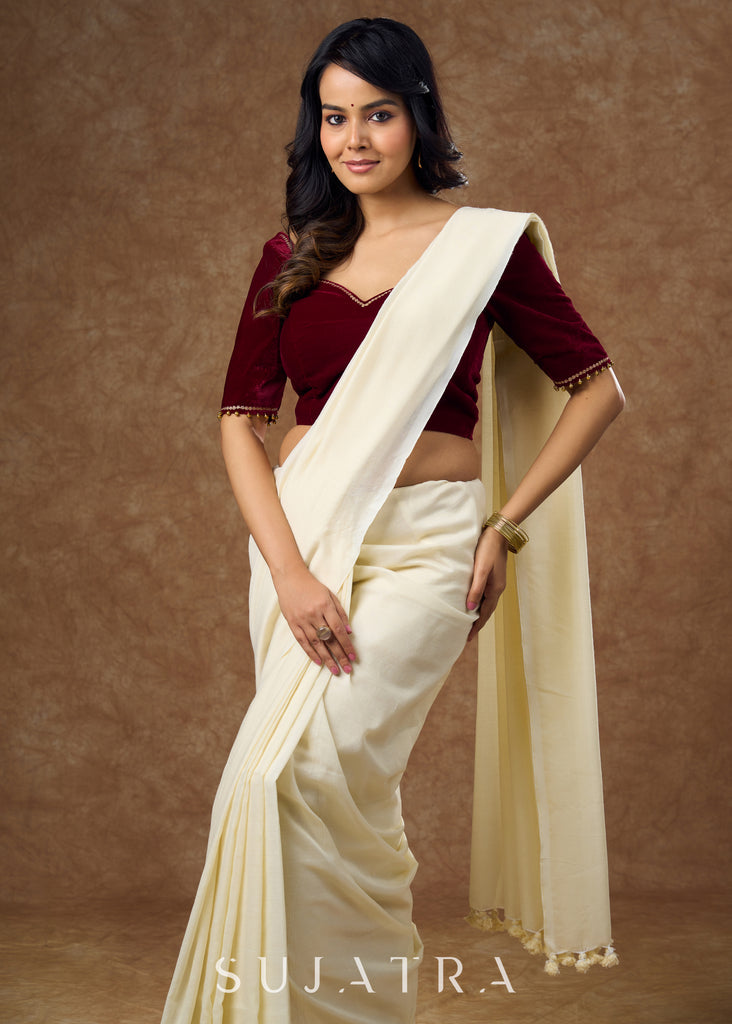 Rich maroon velvet blouse with subtle embroidery & gold detailing on sleeves