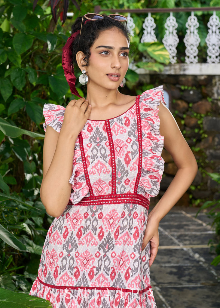 Beautiful self embroidered sleeveless cotton dress with beautiful back details highlighted with lace