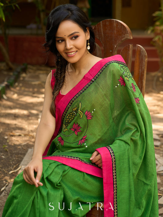 Green Cotton Saree with Handpainted Florals and Contrasting Pink & Black Border
