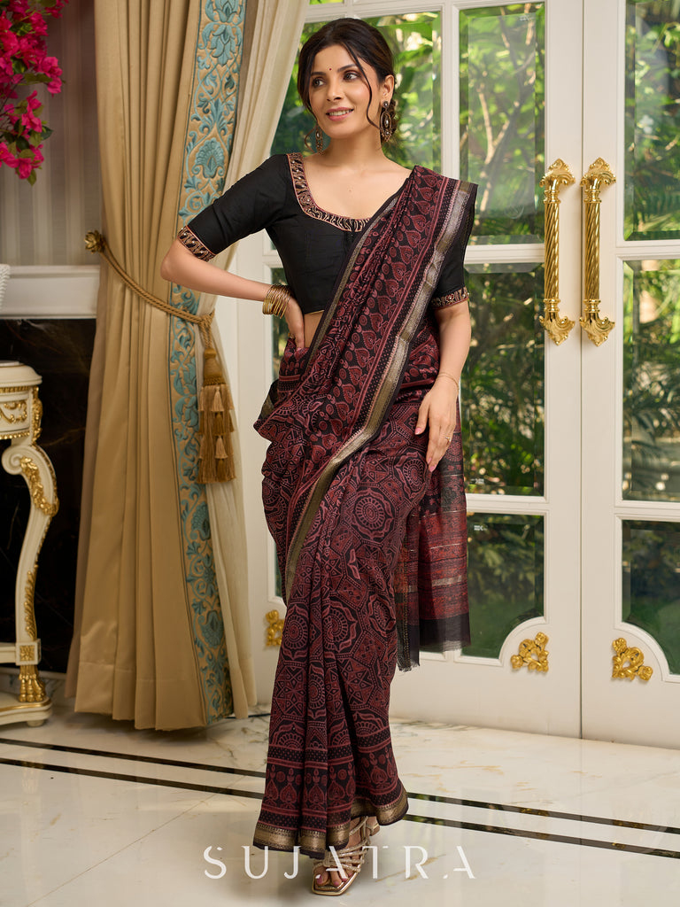 Pure Maheshwari saree with bold Ajrakh prints and regal zari border