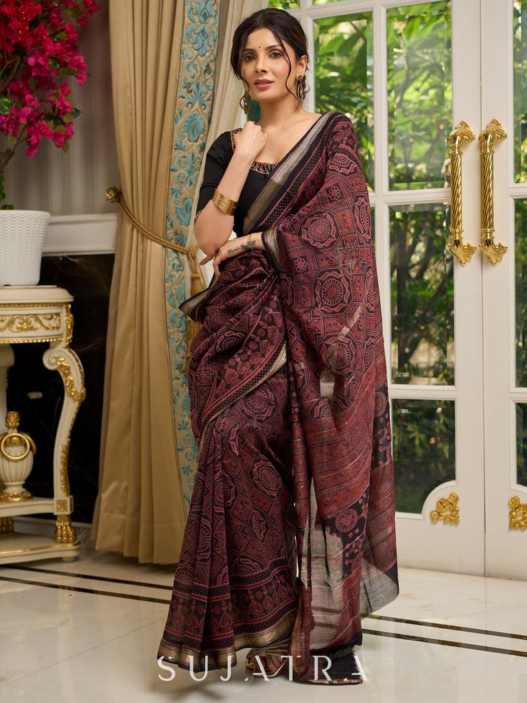 Pure Maheshwari saree with bold Ajrakh prints and regal zari border