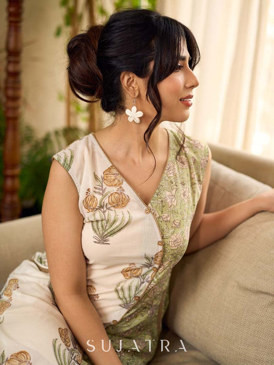 Jaipur-printed sleeveless dress featuring a half-and-half butta and jaal combination, designed with an overlapping silhouette, soft drop shoulders, and wooden accents for an artisanal, contemporary look.