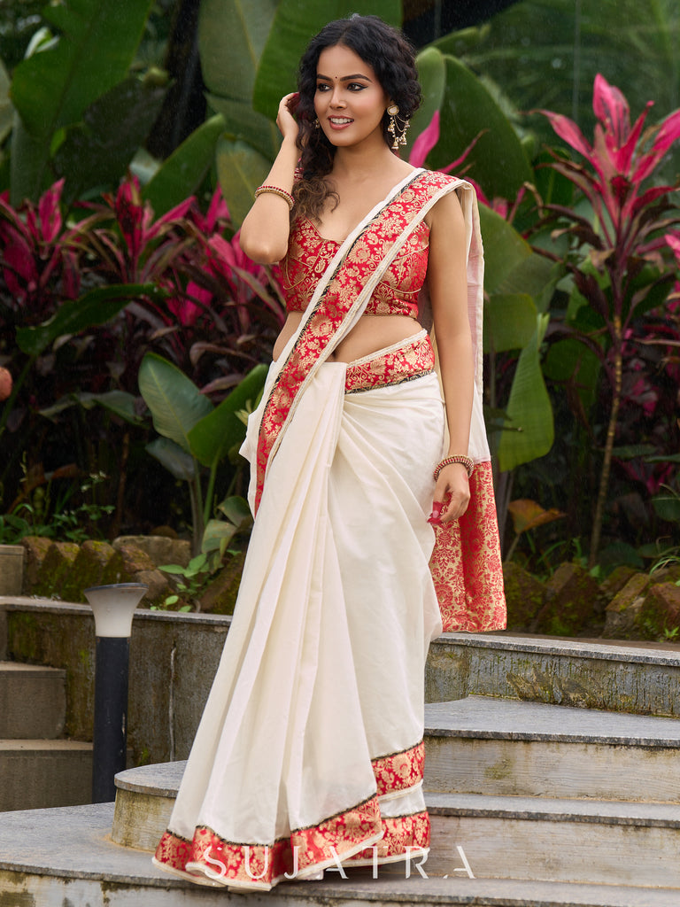 Ivory elegance with royal red Banarasi border, timeless festive glamour