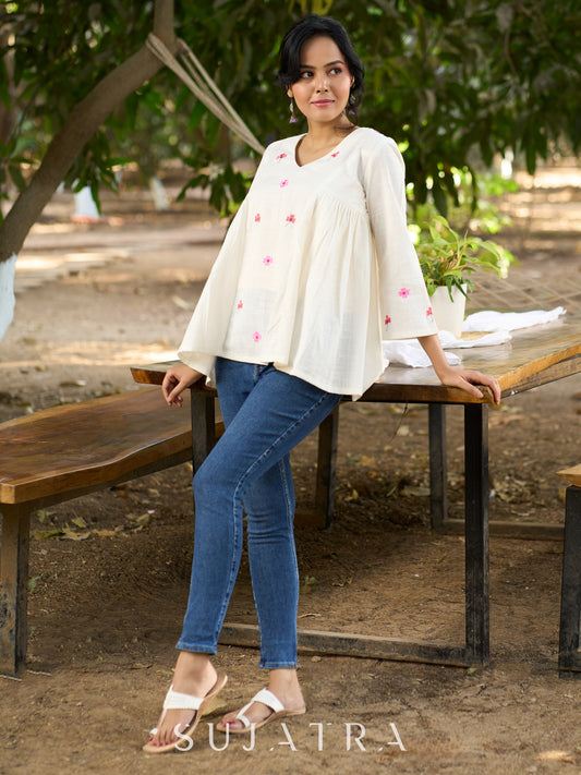 Blissful White Cotton Top with Intricate Hand Embroidery, V Neckline & Side Gathers