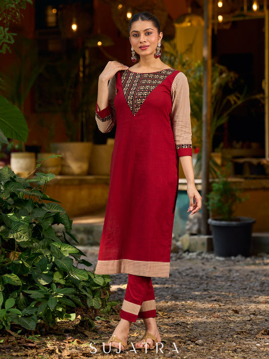 Handcrafted maroon kurta with a V-neck Ajrakh panel and stylish striped sleeves.