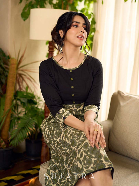 Olive floral dress featuring a contrasting black yoke, designed in a straight fit and highlighted with subtle floral accents for a clean, elegant earthy look