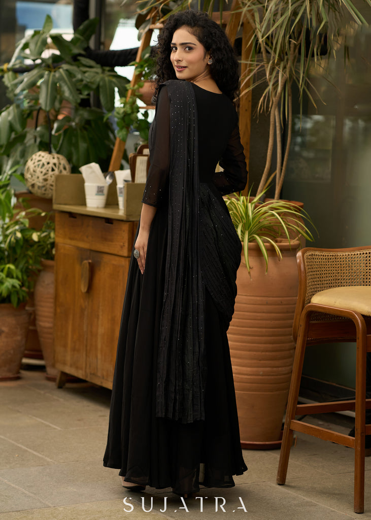 Trendy black georgette saree gown with self embroidered pallu - Brooch optional