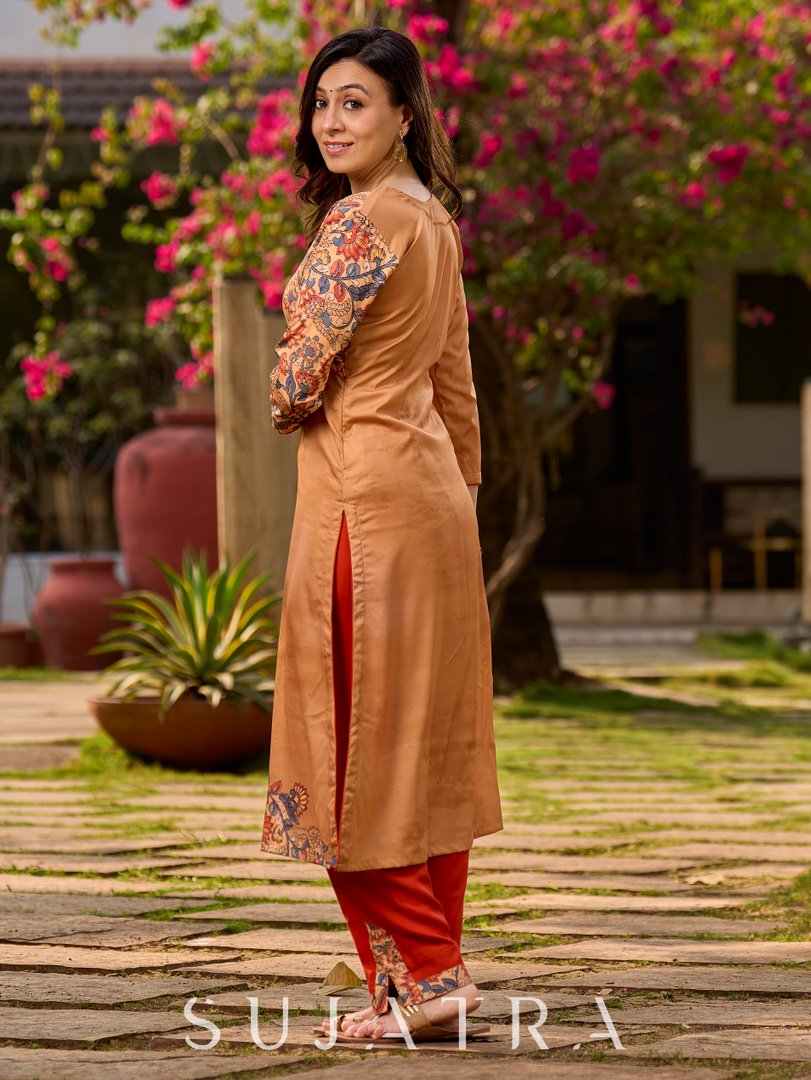 Elegant mustard kurta featuring Kalamkari print in an asymmetrical layout