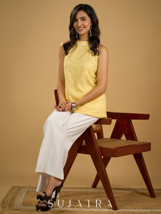 Stylish halter neck top crafted in soft yellow hakoba .