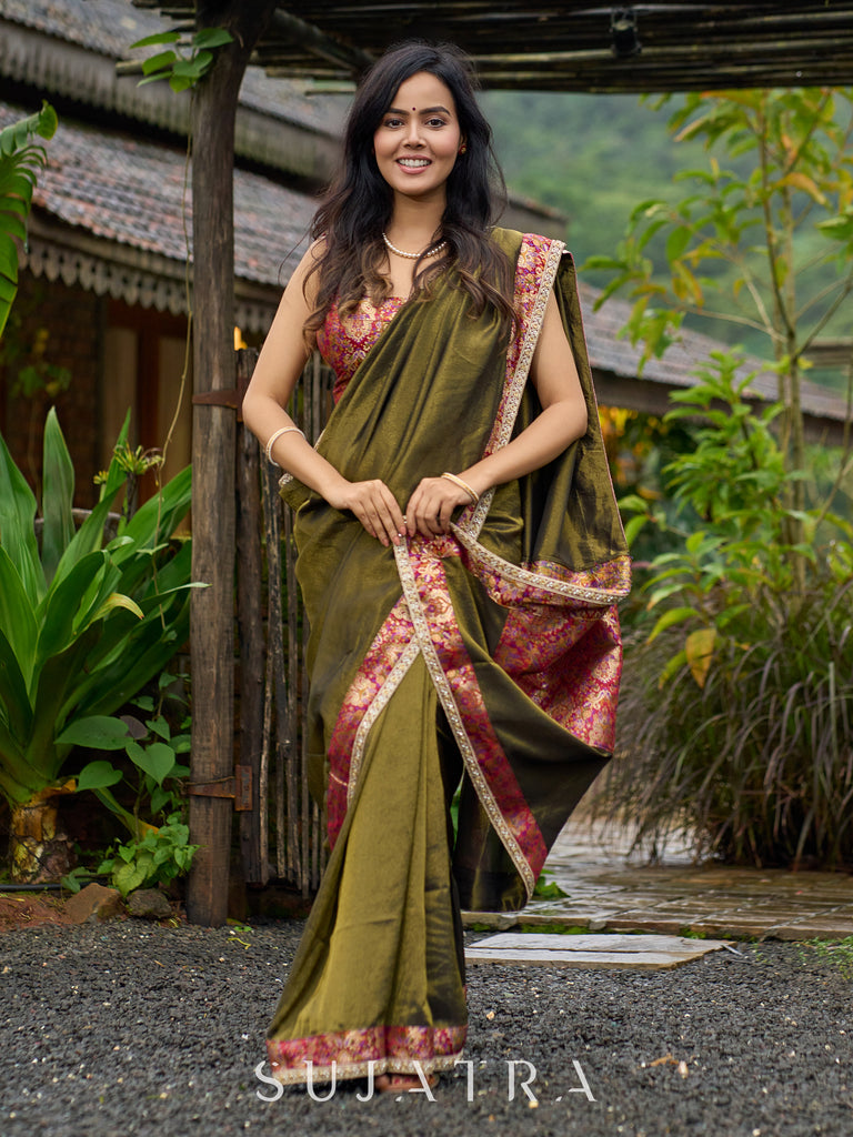 Regal olive tissue saree enhanced by intricate Banarasi brocade border