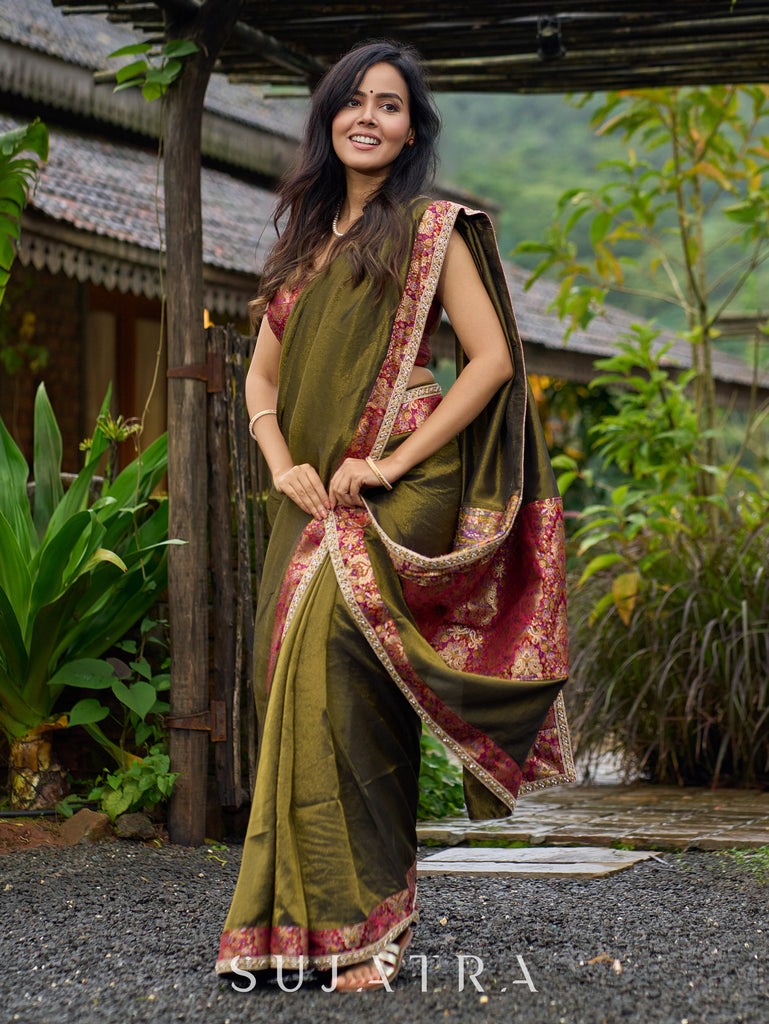 Regal olive tissue saree enhanced by intricate Banarasi brocade border