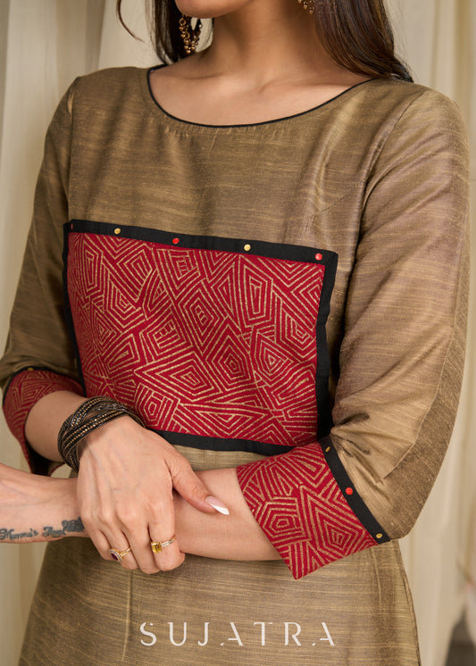 Golden cotton silk kurta featuring bold block print accents & intricate artwork detailing