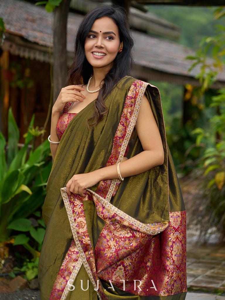 Regal olive tissue saree enhanced by intricate Banarasi brocade border
