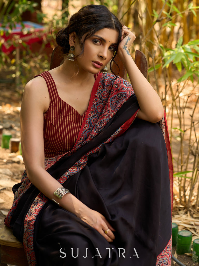 Noir Grace : Exclusive Modal Silk Saree with Red Ajrakh Border